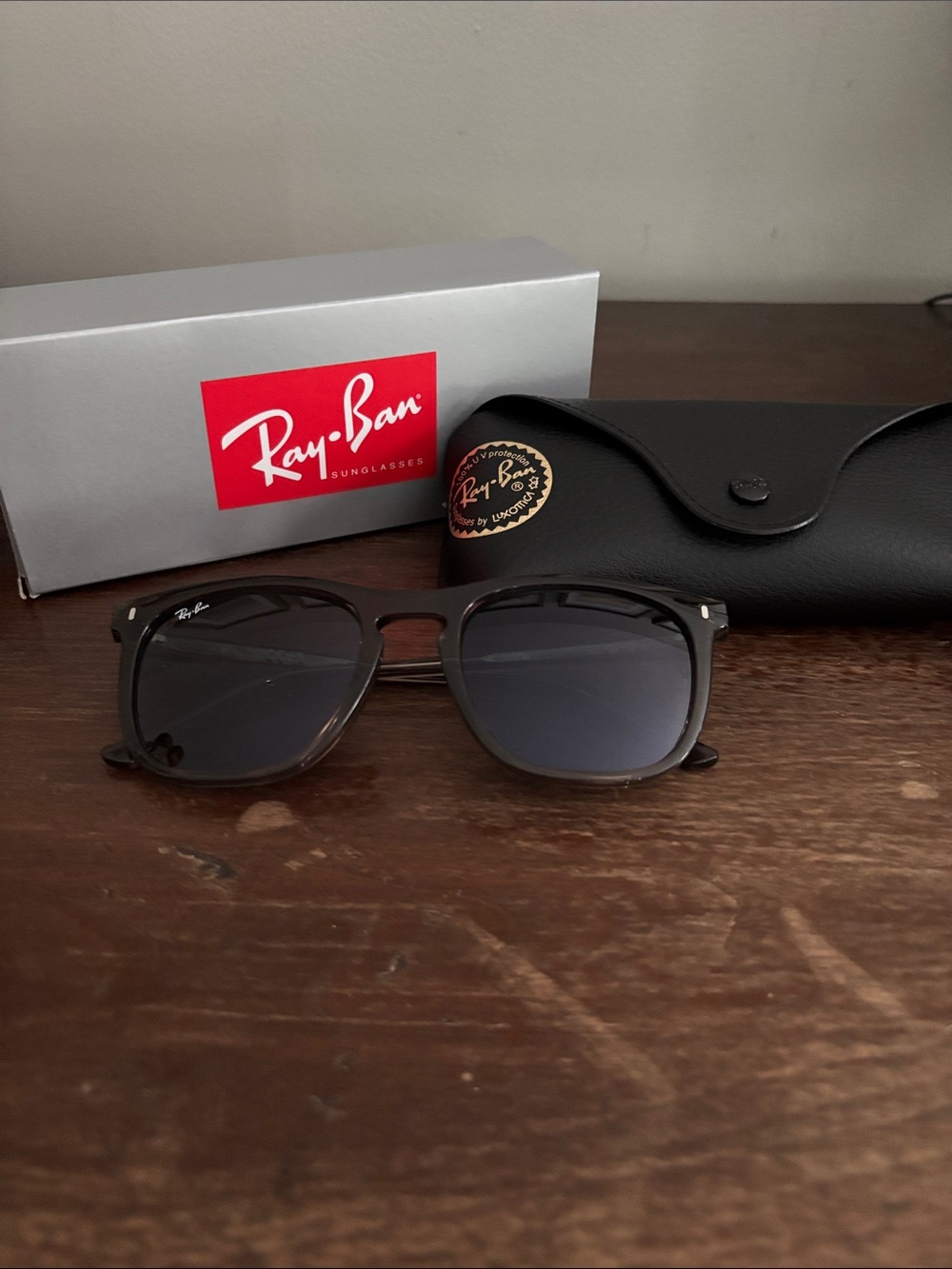 Ray-Ban Black Frame Sunglasses with Dark Gray Lenses